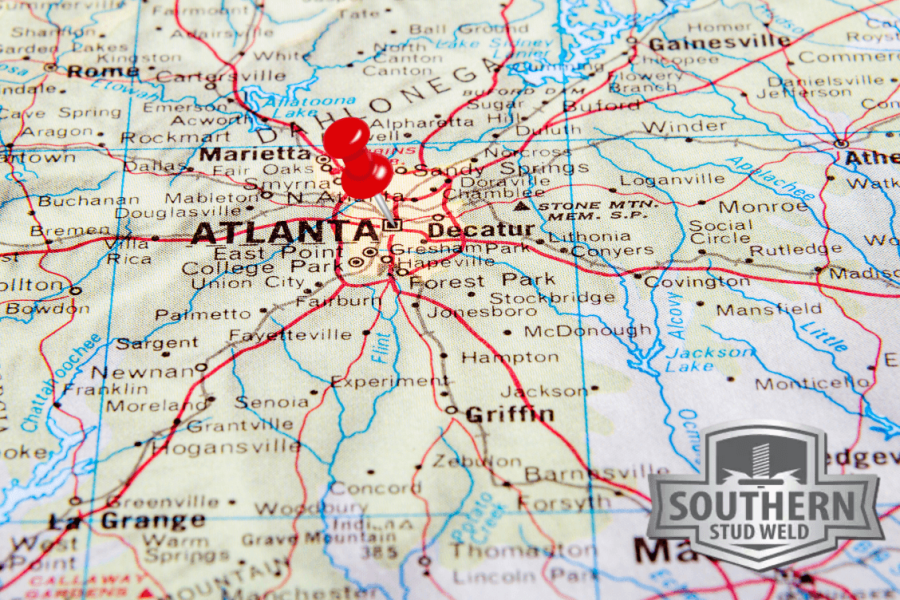Southern Stud Weld logo over a map of Atlanta, Georgia with a red pin marking the city and surrounding areas like Marietta and Decatur.